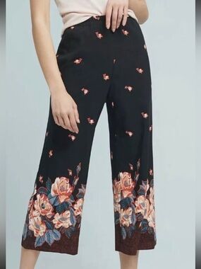 Anthropologie Black Pants with Red Trim and Floral Accent